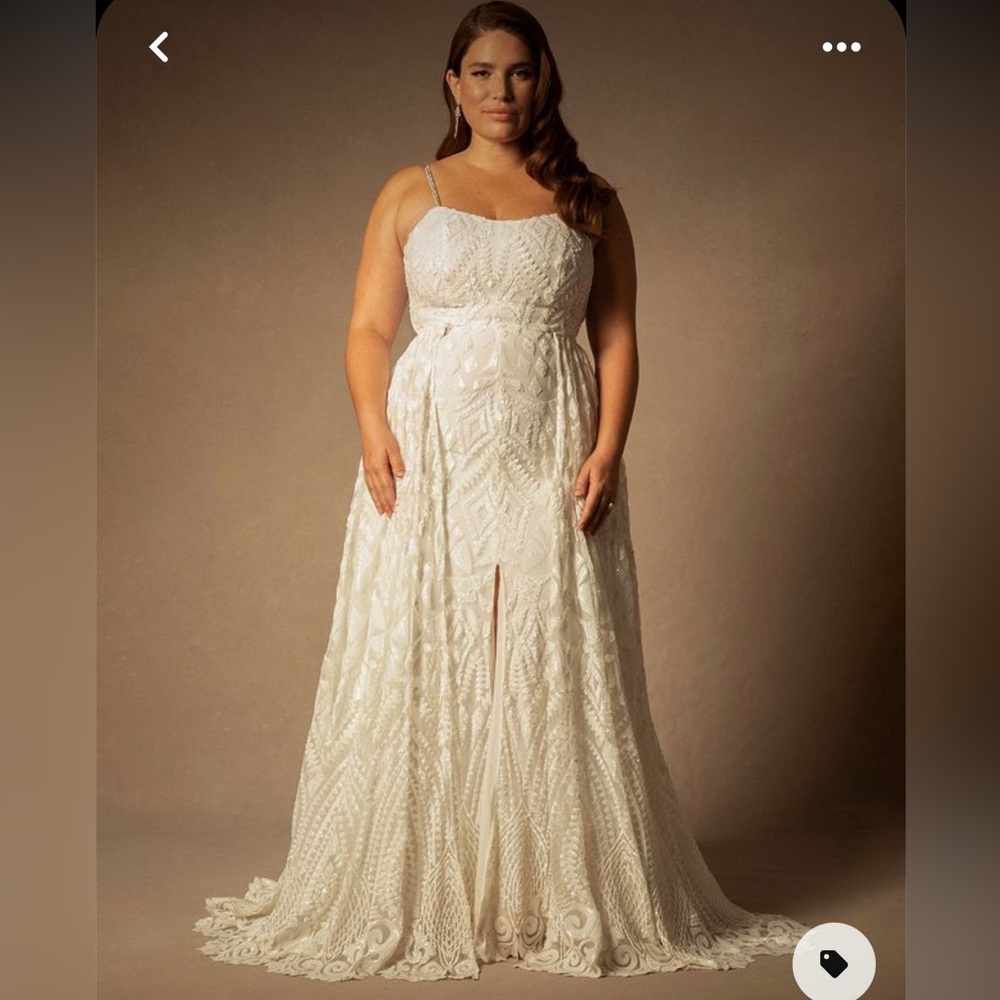 Bridal by Eloquii sequined gown with detachable overskirt.